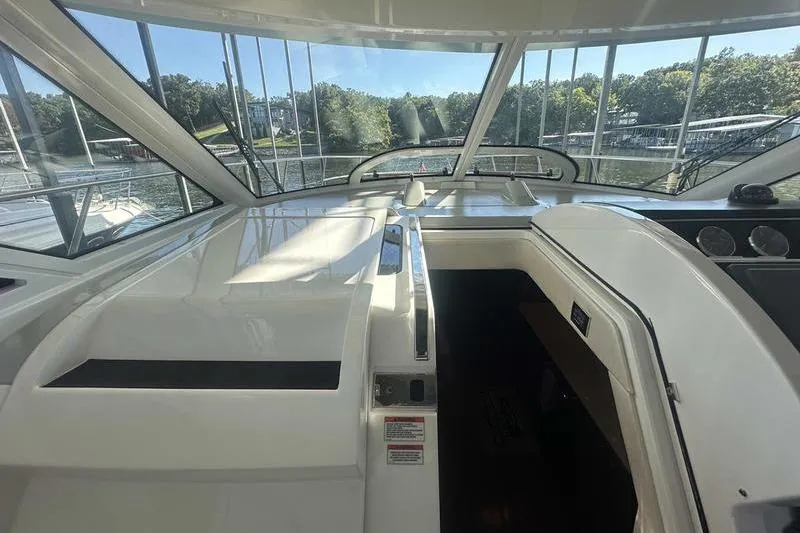 Slide: The Image of 2010 Sea Ray 450 Sundancer yacht interior with panoramic windows and sleek design. - 22