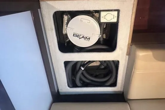 Slide: The Image of 2010 Sea Ray 450 Sundancer interior with Beam central vacuum system. - 29