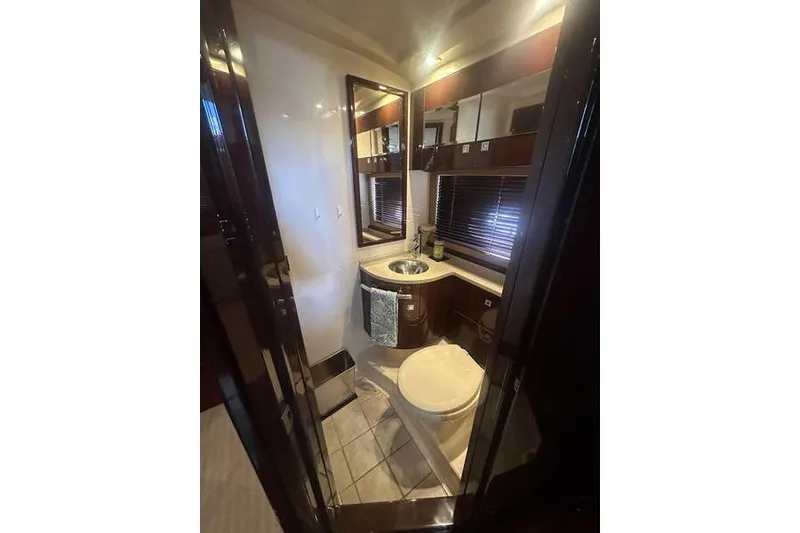Slide: The Image of Luxurious bathroom in 2010 Sea Ray 450 Sundancer yacht with modern fixtures. - 36