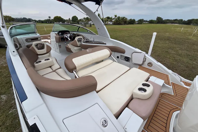 Slide: The Image of 2019 Crownline Eclipse E275 XS boat with luxurious seating and modern interior design. - 10