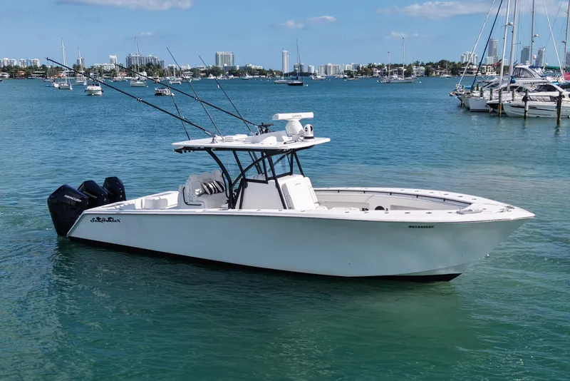 The Image of 2024 SeaHunter 35 Tournament boat on calm water, surrounded by other vessels. - 0