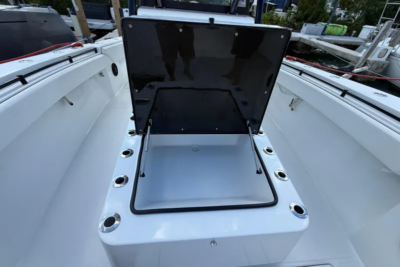 Slide: The Image of 2024 SeaHunter 35 Tournament boat with open storage compartment on deck. - 20