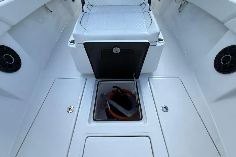 Slide: The Image of 2024 SeaHunter 35 Tournament boat interior with storage compartment and seating. - 21