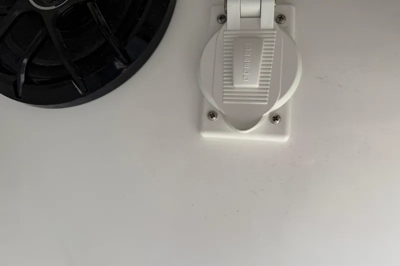 Slide: The Image of 2024 SeaHunter 35 Tournament boat detail showing a speaker and electrical outlet. - 34