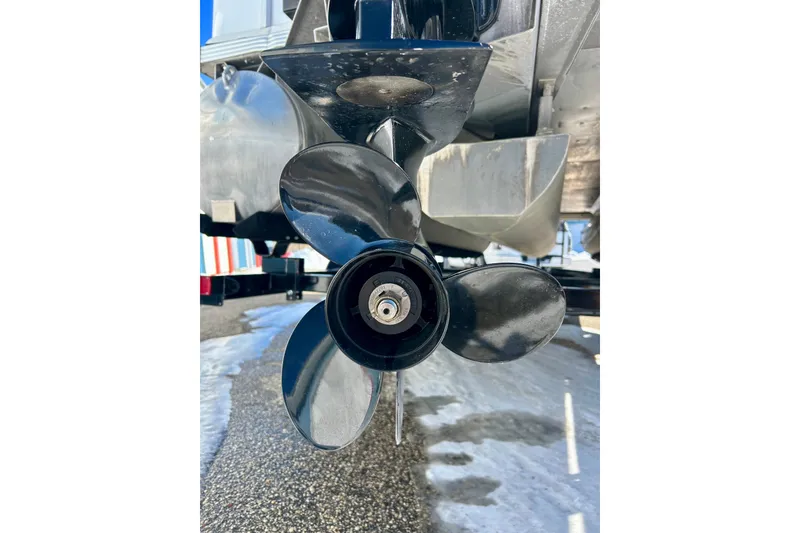 Slide: The Image of Close-up of a 2007 Crest LE 2270 boat propeller on a snowy surface. - 10