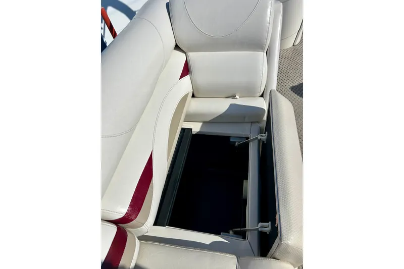 Slide: The Image of Crest LE 2270 2007 boat seat with open storage compartment, white and maroon upholstery. - 30