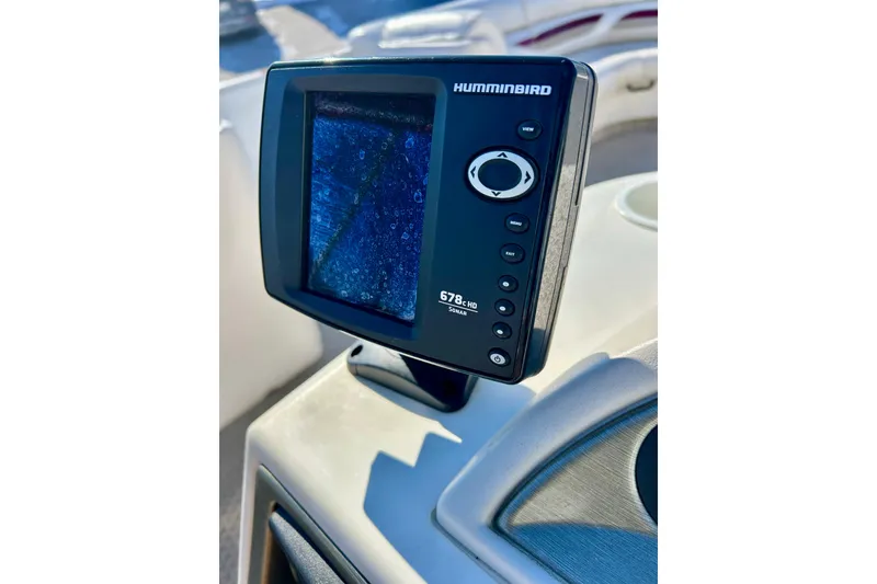 Slide: The Image of Humminbird 678c HD sonar device on 2007 Crest LE 2270 boat dashboard. - 41