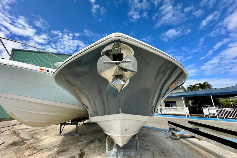 Slide: The Image of 2019 Tidewater 252 CC Adventure boat cruising on open water. - 4