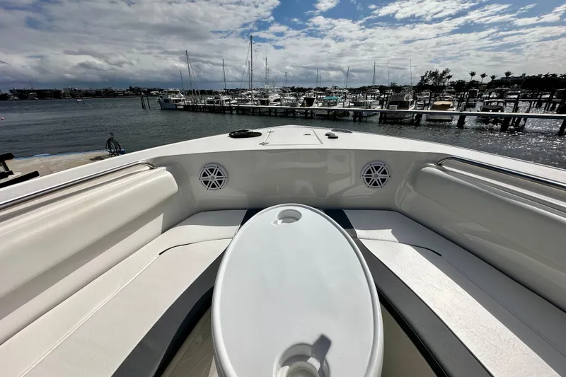 Slide: The Image of 2019 Tidewater 252 CC Adventure boat interior with harbor view. - 56