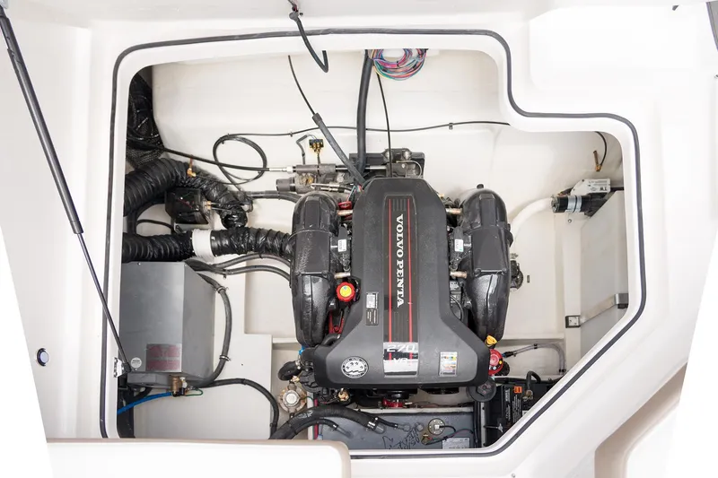 Slide: The Image of Engine compartment of a 2016 Regal 28 Express boat with Volvo Penta engine. - 9