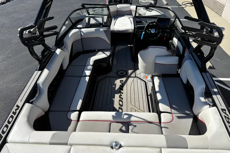 Slide: The Image of 2020 Moomba Craz boat interior with spacious seating and modern dashboard design. - 6
