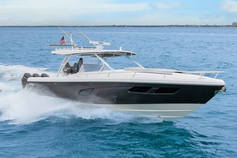 Slide: The Image of 2024 Intrepid 41 Valor cruising on open water, showcasing sleek design and powerful performance. - 1