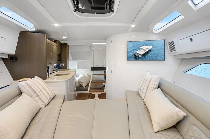 Slide: The Image of Luxurious interior of 2024 Intrepid 41 Valor yacht with modern amenities and elegant design. - 26