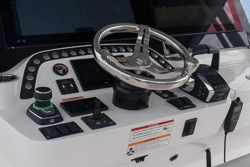 Slide: The Image of 2024 Intrepid 41 Valor helm with advanced controls and navigation system. - 39