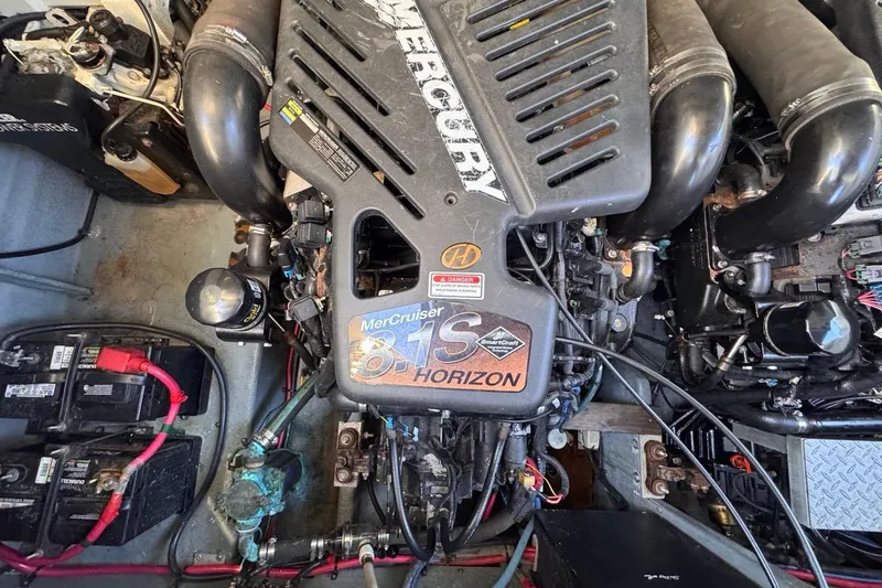 Slide: The Image of Engine compartment of a 2004 Sea Ray 340 Sundancer with MerCruiser 8.1S Horizon engine. - 89