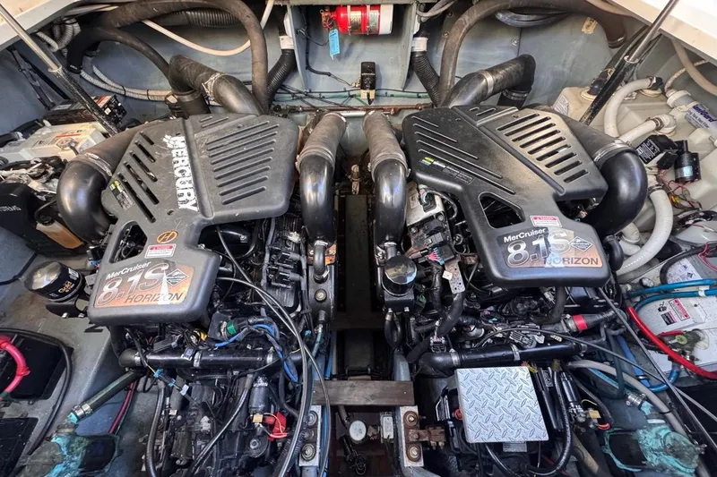 Slide: The Image of Engine compartment of a 2004 Sea Ray 340 Sundancer with twin MerCruiser 8.1S Horizon engines. - 90