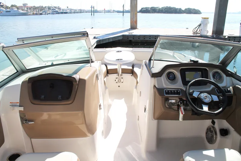 Slide: The Image of Interior view of 2015 Chaparral 224 Sunesta boat with steering wheel and dashboard. - 32
