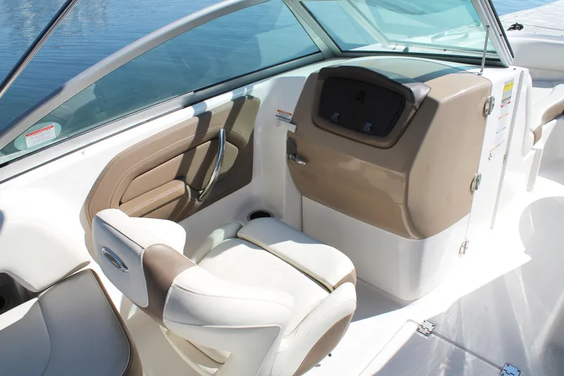 Slide: The Image of 2015 Chaparral 224 Sunesta boat interior with beige and white seating. - 38