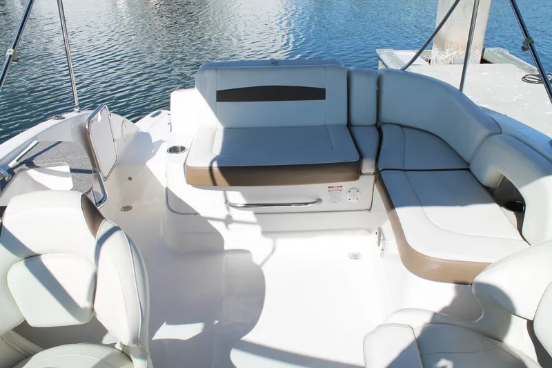 Slide: The Image of 2015 Chaparral 224 Sunesta boat interior with spacious seating and water view. - 46