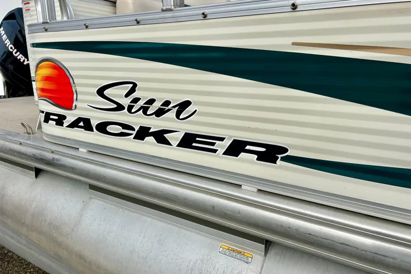 Slide: The Image of 2010 Sun Tracker Party Barge 20 Classic Series pontoon boat with logo detail. - 6
