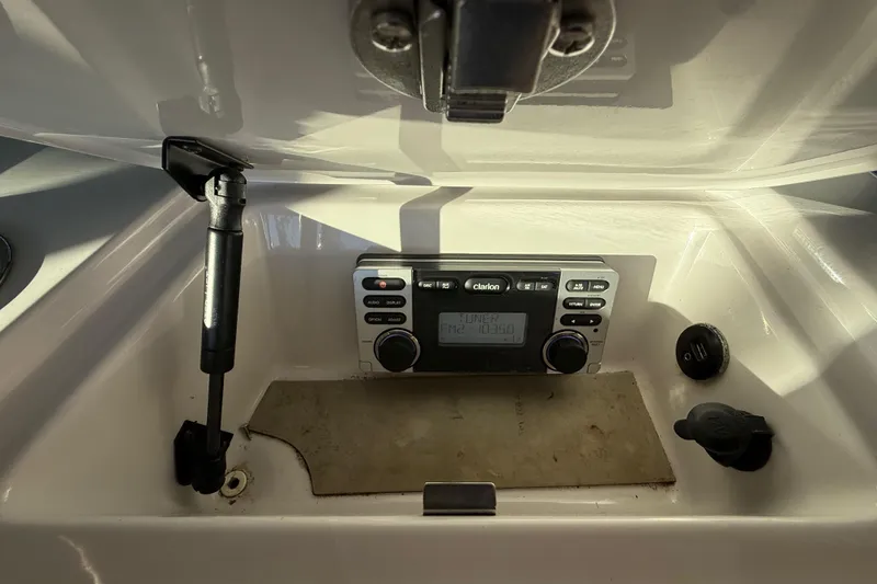 Slide: The Image of Polk Audio speaker in 2010 Nautique Super Air Nautique 210 boat interior. - 24