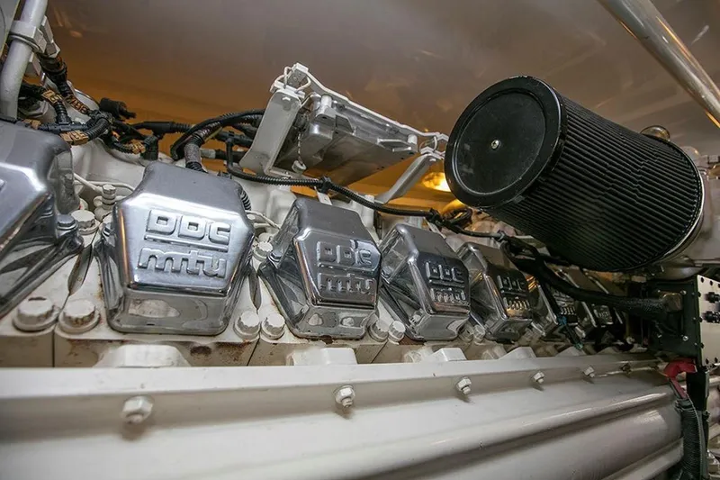 Slide: The Image of Engine of 2003 Viking 65 Convertible yacht, featuring DDC MTU components. - 4