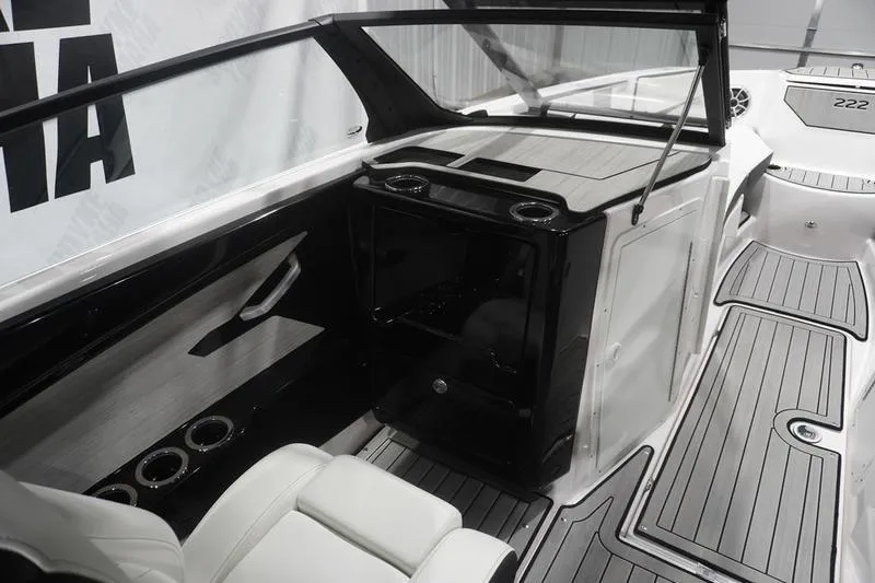 Slide: The Image of 2024 Yamaha Boats 222SD interior with sleek seating and modern dashboard design. - 19