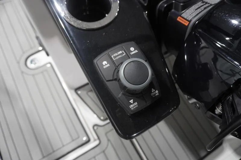 Slide: The Image of Control panel of 2024 Yamaha Boats 222SD with navigation and cruise features. - 24