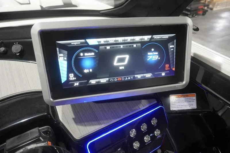 Slide: The Image of 2024 Yamaha Boats 222SD dashboard with digital display and control panel. - 25