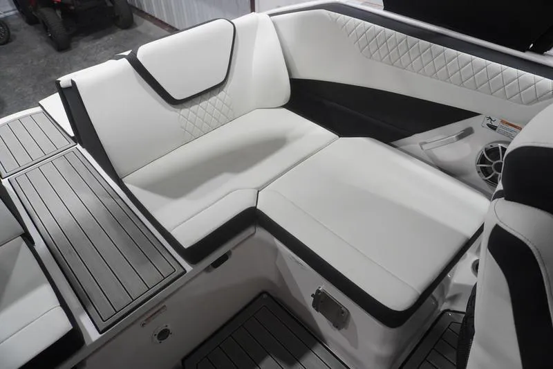 Slide: The Image of 2024 Yamaha Boats 222SD interior with luxurious white seating and modern design. - 28