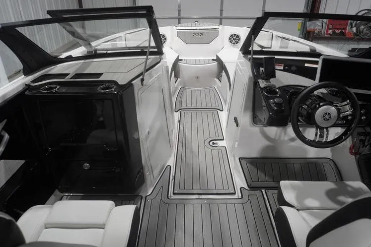 Slide: The Image of 2024 Yamaha Boats 222SD interior, featuring sleek design and modern dashboard controls. - 9