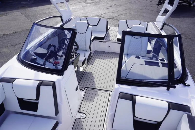 Slide: The Image of 2024 Yamaha Boats 222S interior with sleek seating and modern design. - 15