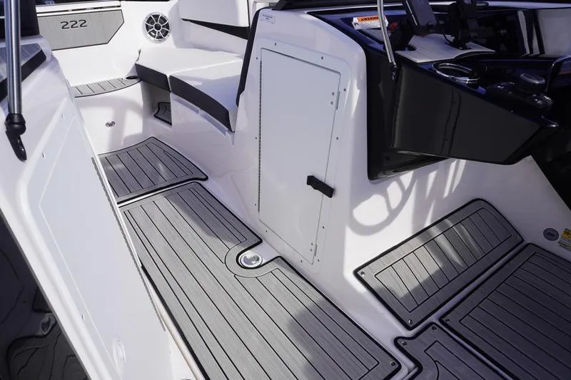 Slide: The Image of 2024 Yamaha Boats 222S interior with sleek seating and modern design. - 17