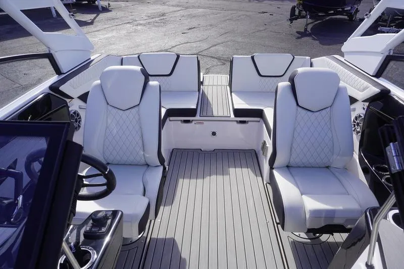 Slide: The Image of 2024 Yamaha Boats 222S interior with luxurious seating and modern design. - 19