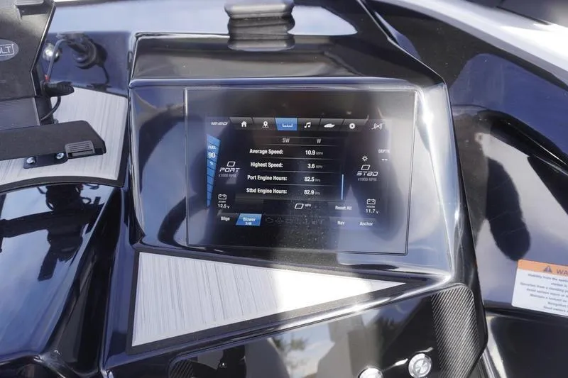 Slide: The Image of 2024 Yamaha Boats 222S dashboard display showing engine and speed metrics. - 23
