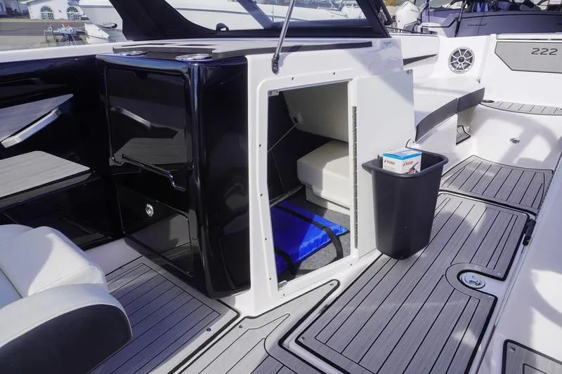 Slide: The Image of 2024 Yamaha Boats 222S interior with seating, storage, and modern design features. - 28