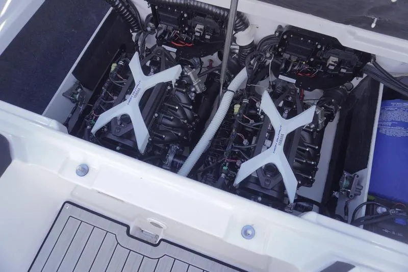 Slide: The Image of 2024 Yamaha Boats 222S engine compartment with dual engines and wiring. - 35