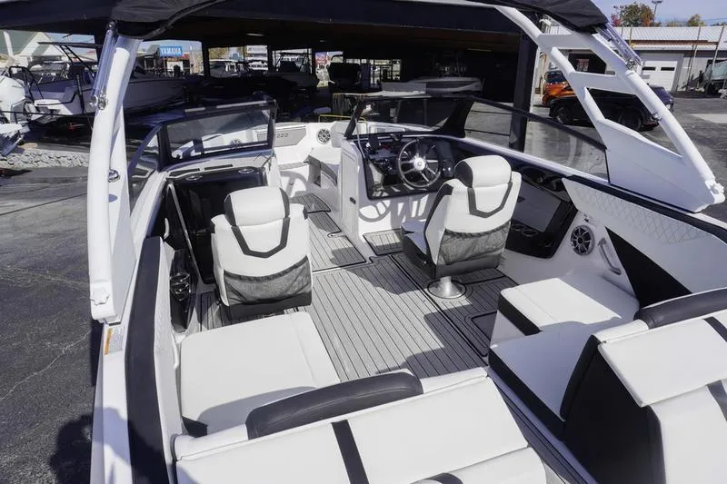 Slide: The Image of 2024 Yamaha Boats 222S interior with sleek seating and modern dashboard design. - 5