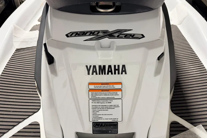 Slide: The Image of 2015 Yamaha WaveRunner FX Cruiser HO, featuring NanoXcel technology and safety warnings. - 14