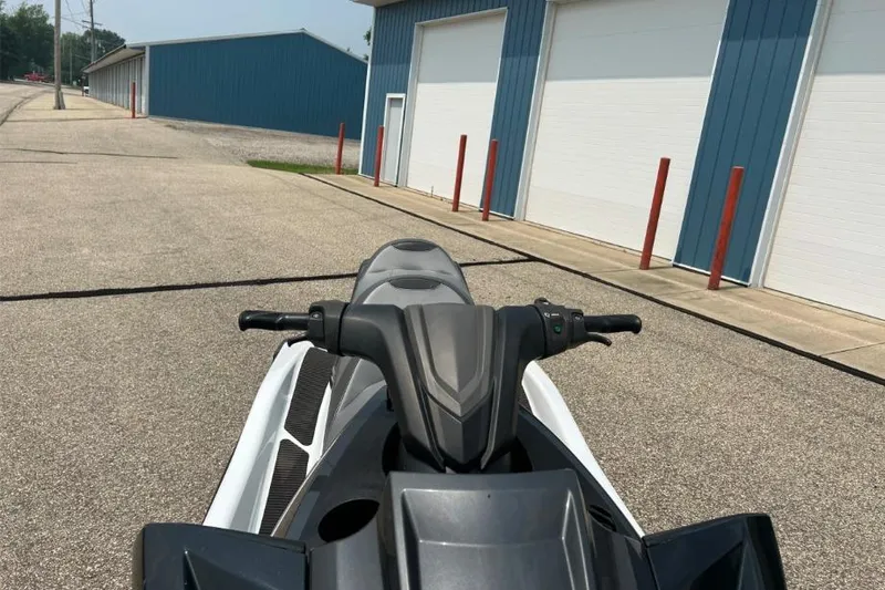 Slide: The Image of 2015 Yamaha WaveRunner FX Cruiser HO parked near blue warehouse buildings. - 5