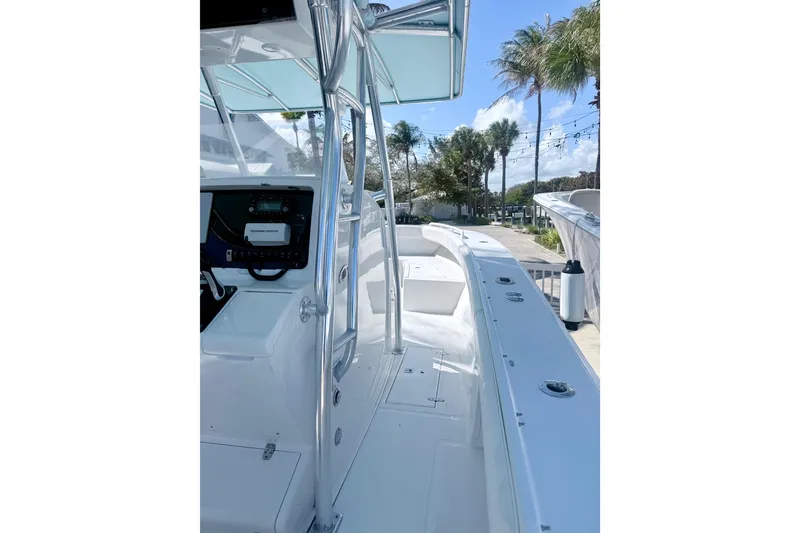 Slide: The Image of 2005 Jupiter 31 Center Console boat with sleek design and modern controls. - 11