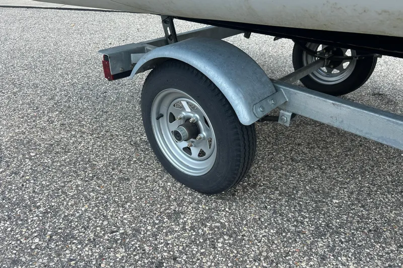 Slide: The Image of Trailer wheel for 2018 AB Inflatables Oceanus 4.30VSC on asphalt surface. - 20