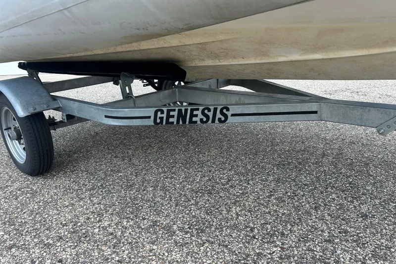 Slide: The Image of Trailer for 2018 AB Inflatables Oceanus 4.30VSC, labeled "GENESIS," on a paved surface. - 25