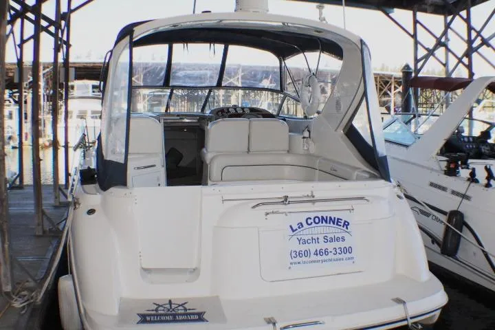 Slide: The Image of 2002 Bayliner 3055 Ciera boat lifted by KMI Sea-Lift at marina. - 2