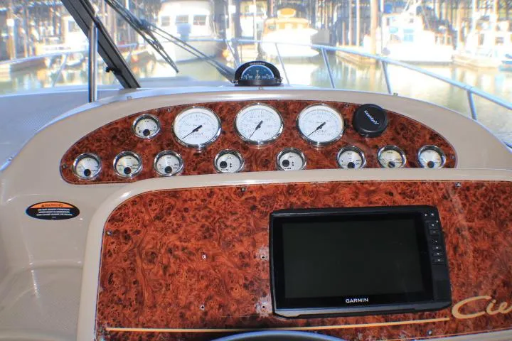Slide: The Image of Control panel of a 2002 Bayliner 3055 Ciera boat with Mercury throttle levers. - 21