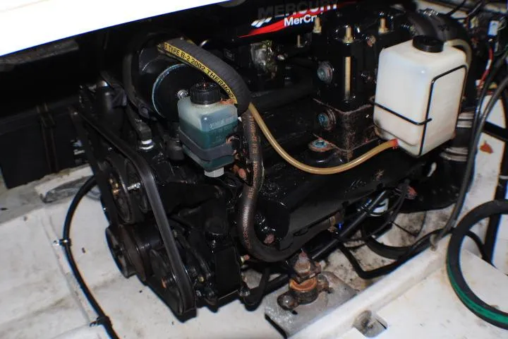 Slide: The Image of Engine of a 2002 Bayliner 3055 Ciera boat, featuring a Mercury 5.7L V8. - 28