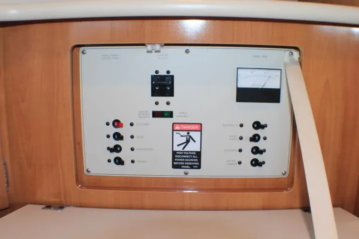 Slide: The Image of Engine compartment of a 2002 Bayliner 3055 Ciera with visible battery setup. - 32