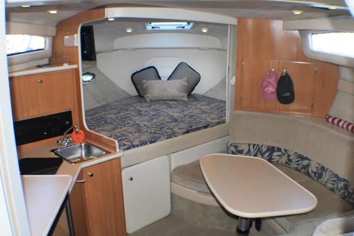 Slide: The Image of 2002 Bayliner 3055 Ciera boat interior with helm and cabin entrance. - 35