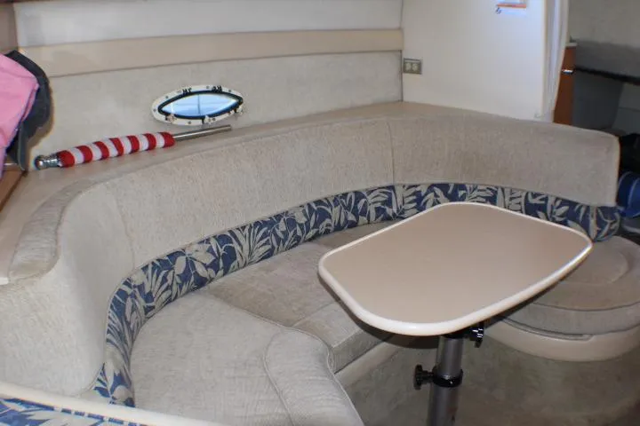 Slide: The Image of Interior of 2002 Bayliner 3055 Ciera boat with cozy seating and nautical decor. - 40