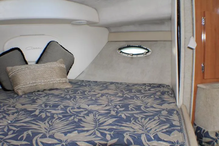 Slide: The Image of 2002 Bayliner 3055 Ciera kitchen area with sink and countertop. - 45